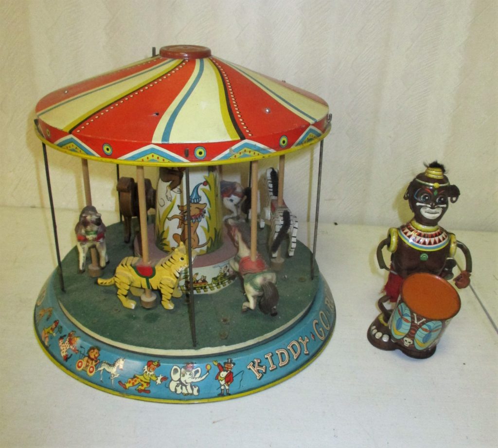 117: Tin Litho Merry-go-round And Monkey