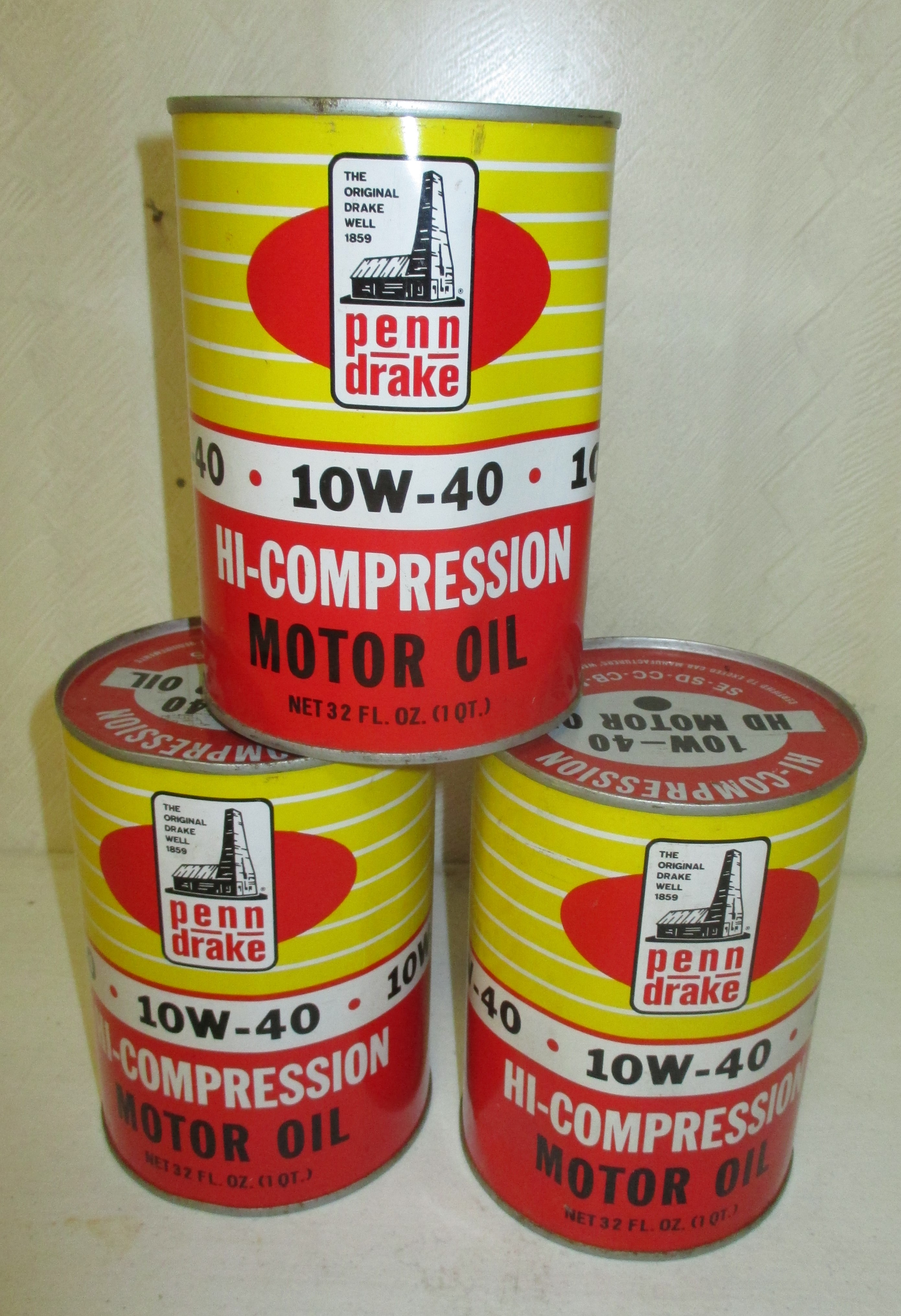 32: (3) Penn Drake Oil Cans