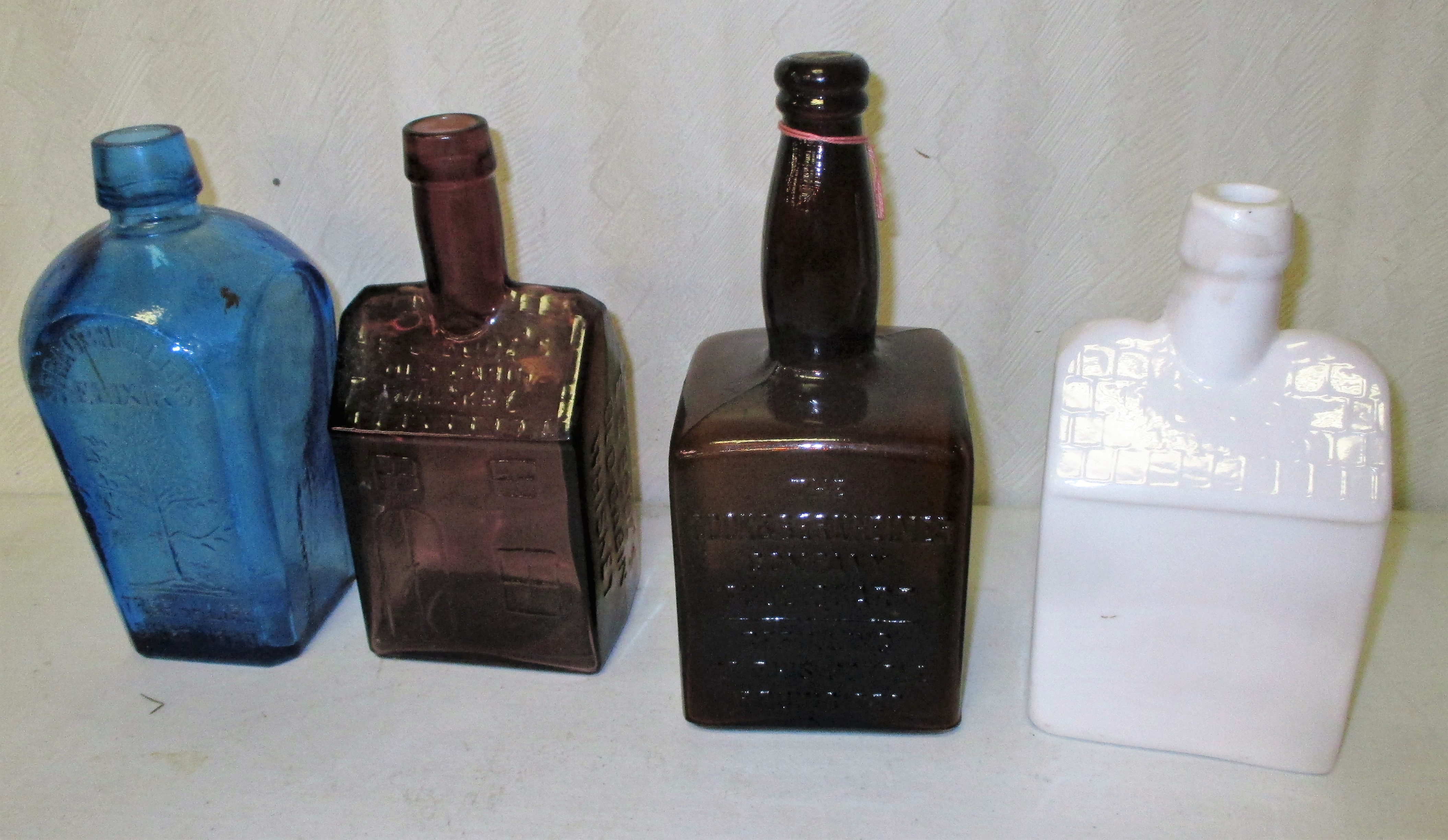 36: (4) Vintage Bottles