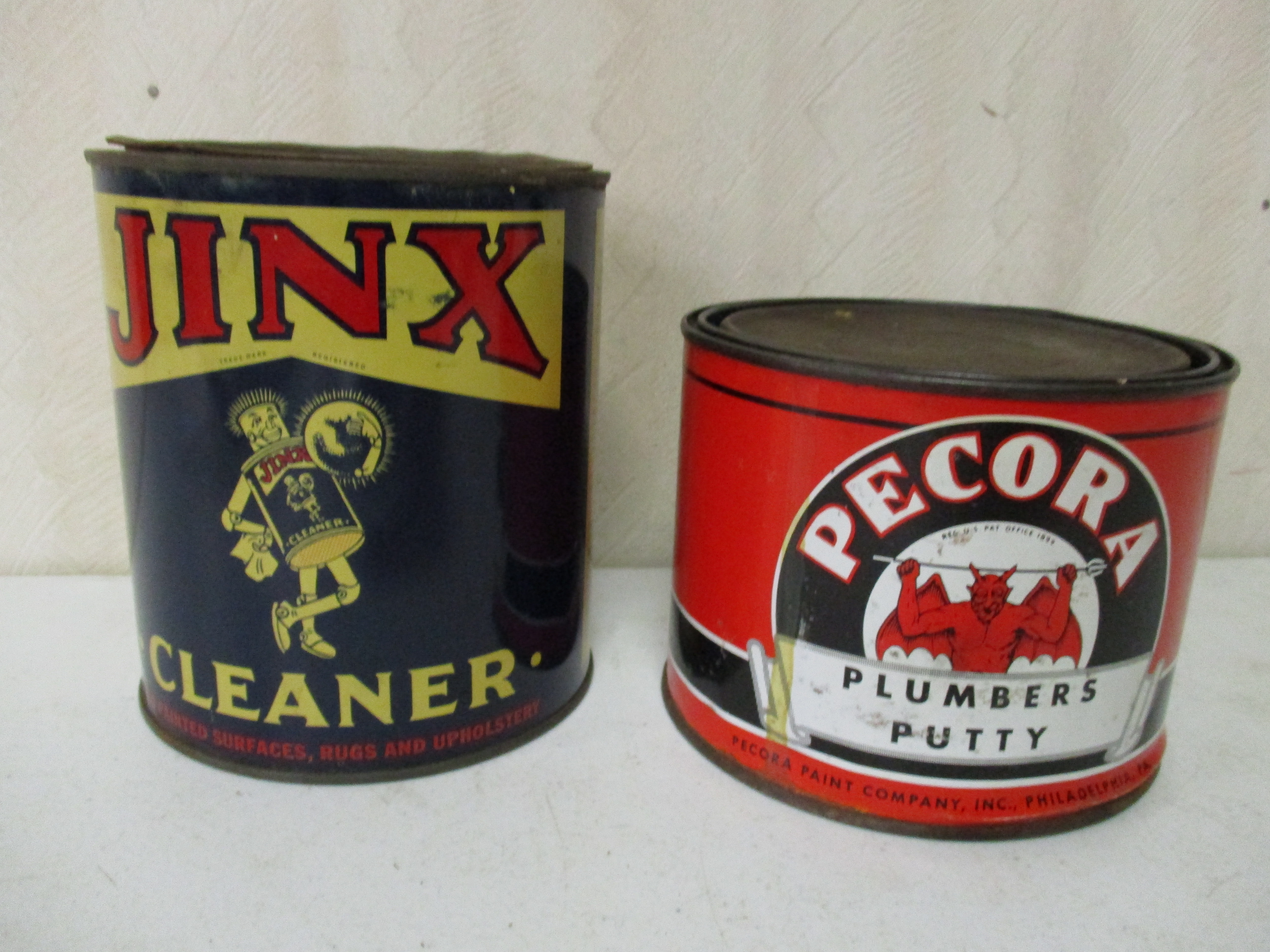 Lot 100: Jinx Cleaner And Pecora Pluimber's Putty Cans