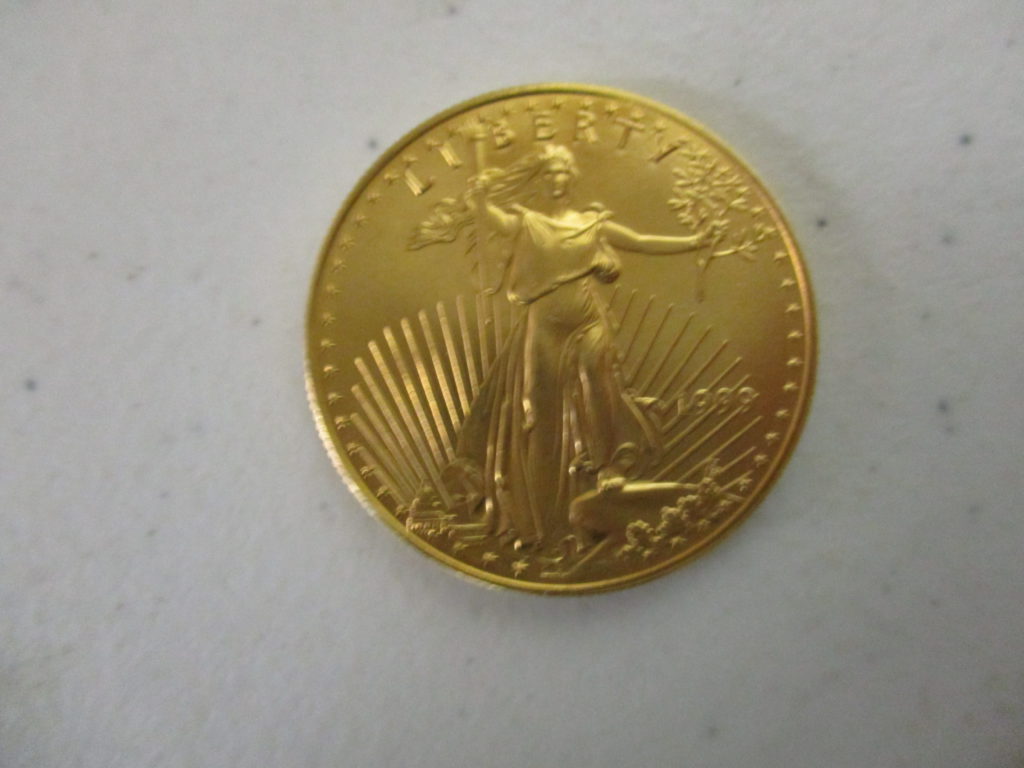 Lot 15: 1999 $50 1oz Gold Coin