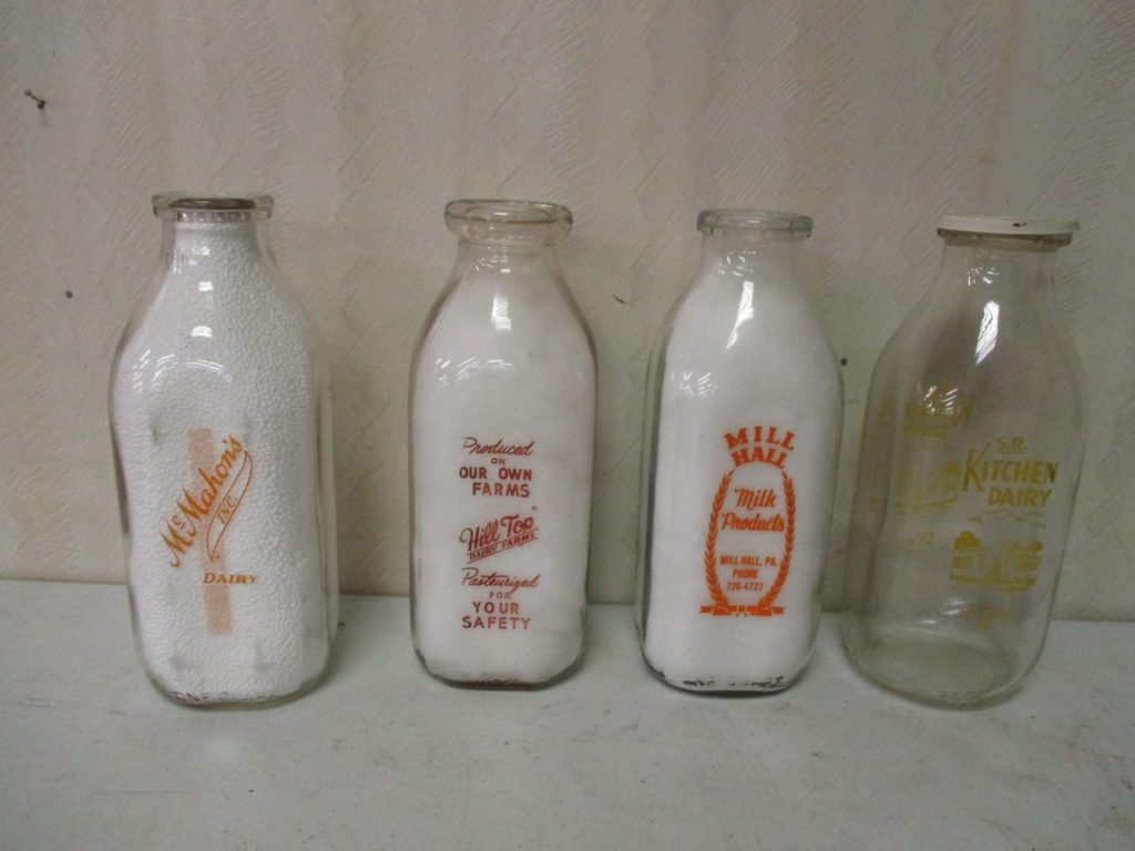 Lot 205: (4) Milk Bottles - McMahon's, Hill Top, Mill Hall And SR Kitchen