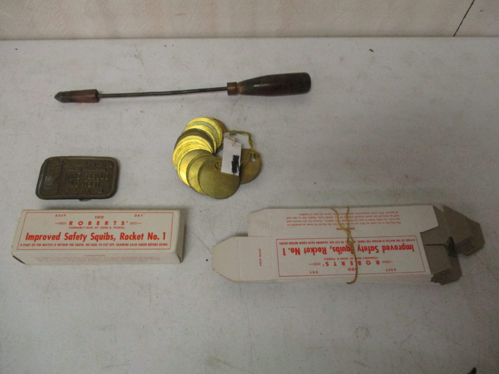 Lot 213: Blank Mining Tags, Belt Buckle, Safety Squibs