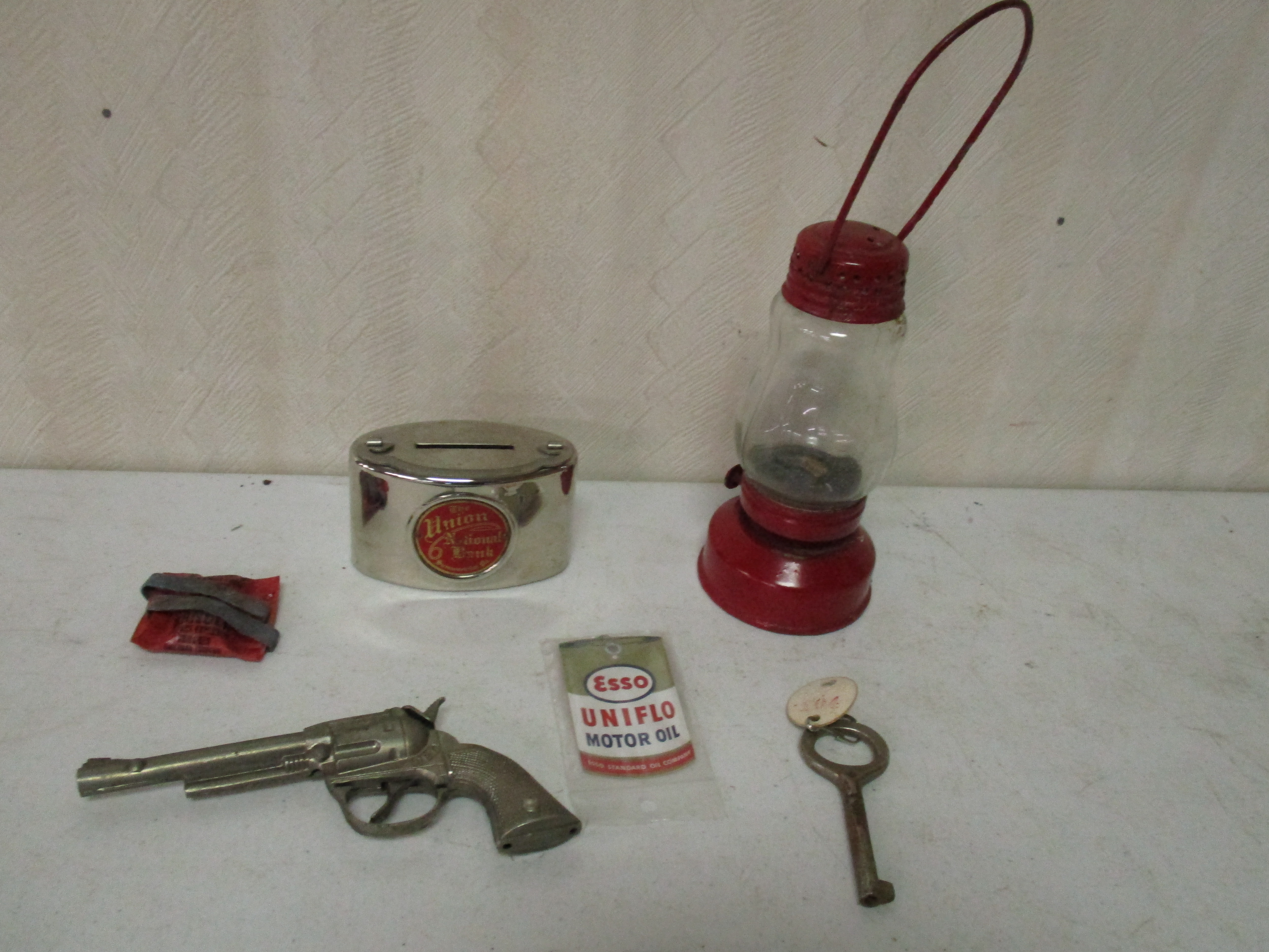 Lot 240: Small Lantern, Cap Gun, ESSO Tag, Bank And Ford Coupe Truck Key