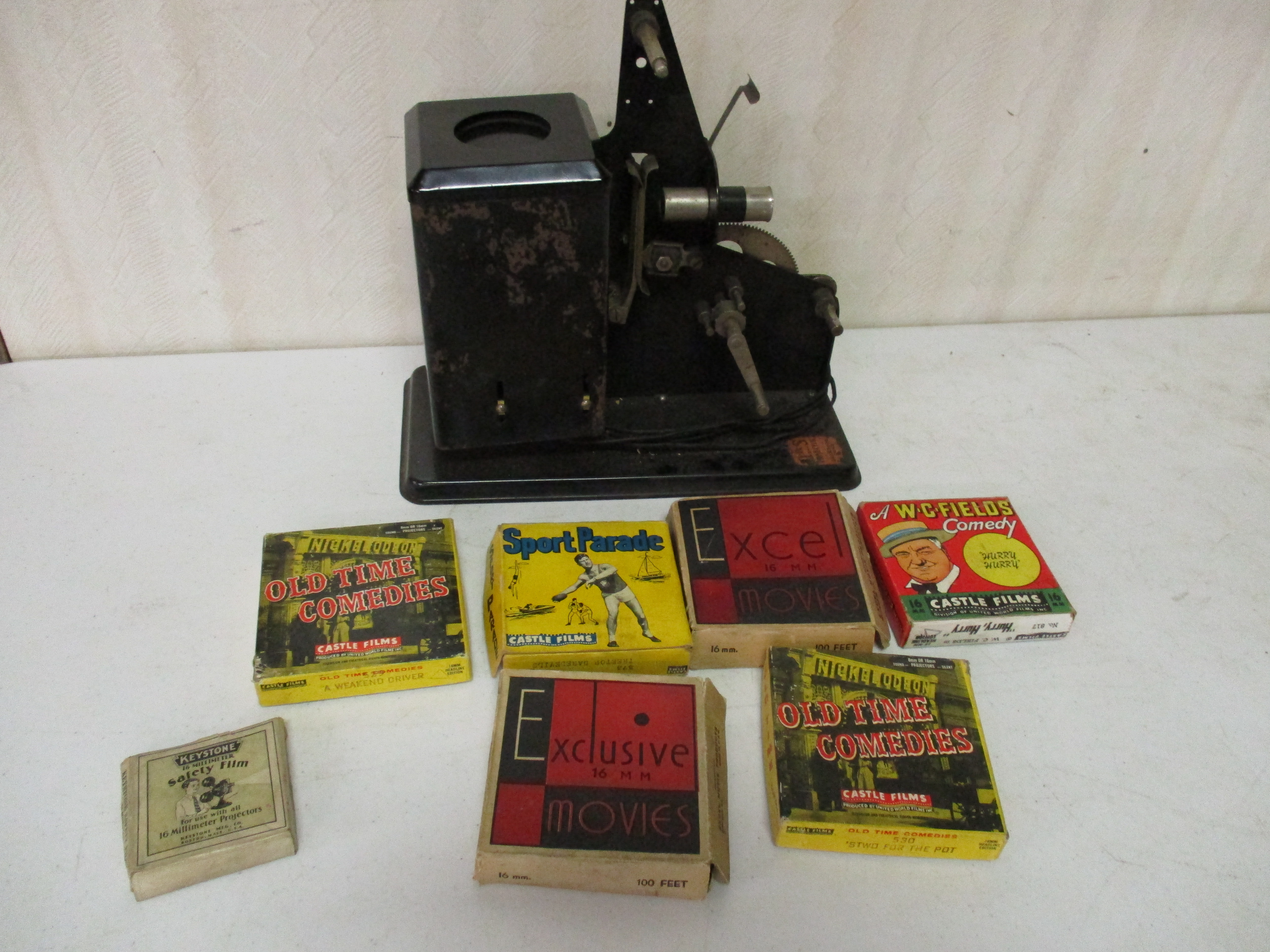 Lot 252: Vintage Film Projector With Film Reels