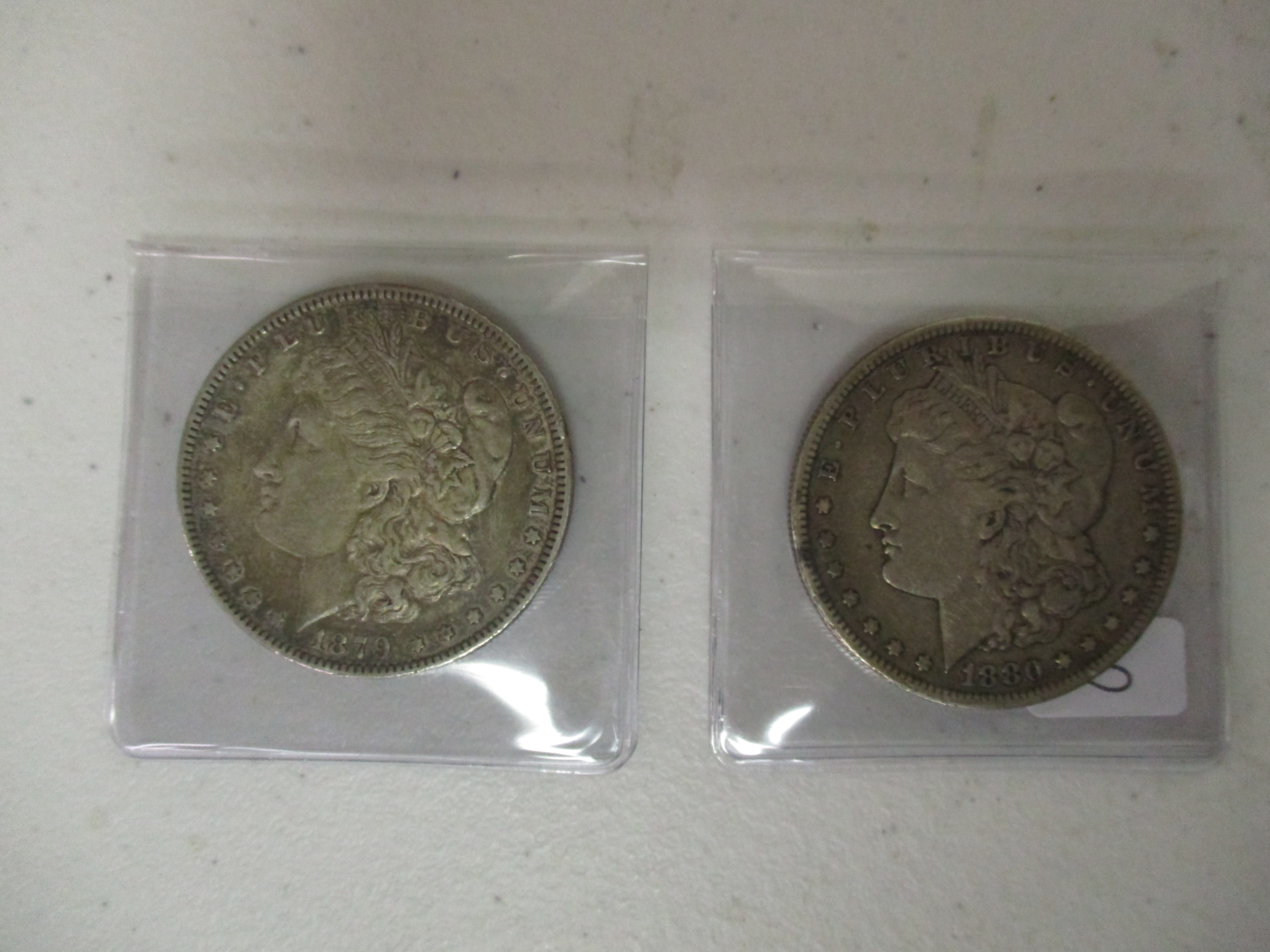 Lot 28: 1879 And 1880S Morgans (by The Piece, Take 2)